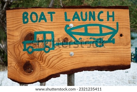 boat launch wooden rustic signboard