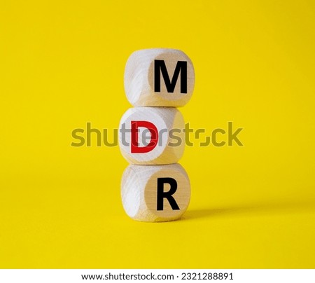 BPM - Business Process Management symbol. Wooden cubes with words BPM. Beautiful yellow background. Business and BPM concept. Copy space.