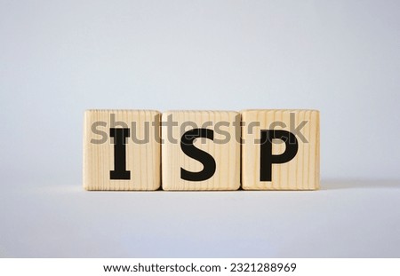 ISP - Internet Service Provider symbol. Concept word ISP on wooden cubes. Beautiful white background. Business and ISP concept. Copy space.