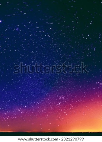 Colourful Night Starry Sky Gradient. Night Dark Blue Sky Glowing Stars Background Backdrop With Sky Gradient. Amazing Night View Sky. Bright Purple, Yellow And Orange Colors. Copy Space.