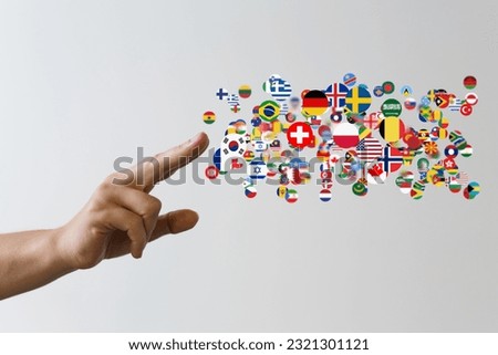 A person presenting a virtual projection of different country flags