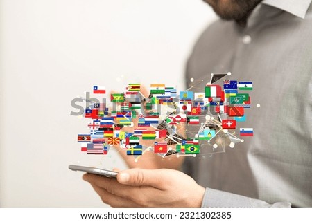 A 3D rendering of the world's national flags on a blurry background