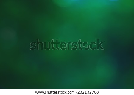 Abstract glowing light on a green background