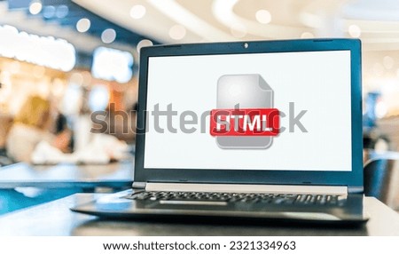 Laptop computer displaying the icon of HTML file
