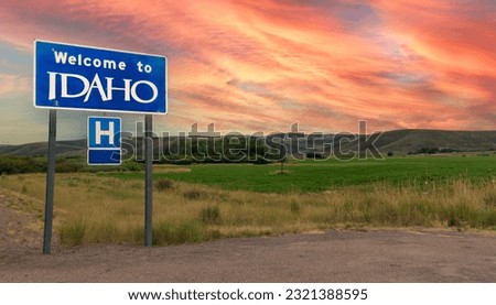 The Welcome to Idaho sign near the road