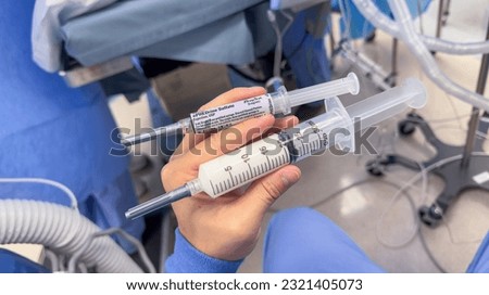 symbolic portrayal of hospital medications in syringes and IV drips, highlighting the crucial role they play in medical treatment and patient care