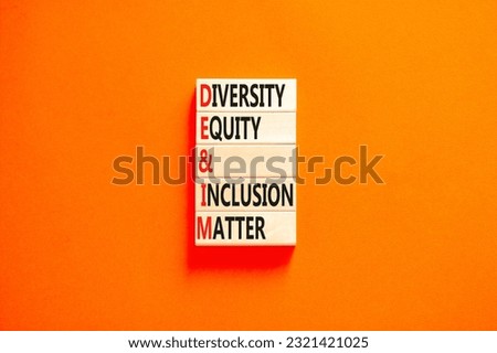 DEI Diversity equity inclusion matter symbol. Concept words DEI diversity equity and inclusion matter on wood block. Beautiful orange background. Business diversity equity inclusion matter concept