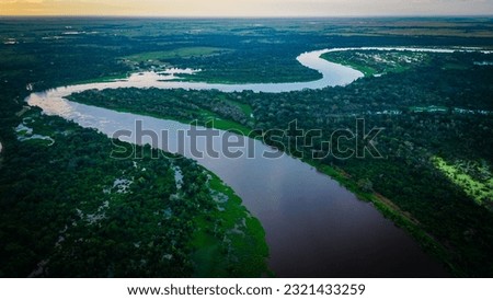Aerial Panoramic View of Pantanal Delta River Through Lush Green Natural Wetland, Tropical Flooded Grasslands, Paraguay River and Brazil Mato Grosso Royalty-Free Stock Photo #2321433259