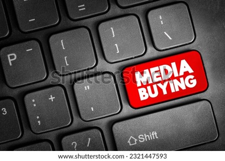 Media Buying - process used in paid marketing efforts, text button on keyboard Royalty-Free Stock Photo #2321447593