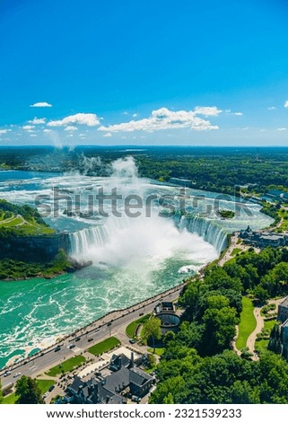 Horseshoe Fall, Niagara Gorge and boat in mist, Niagara Falls, Ontario, Canada. High quality photo Royalty-Free Stock Photo #2321539233