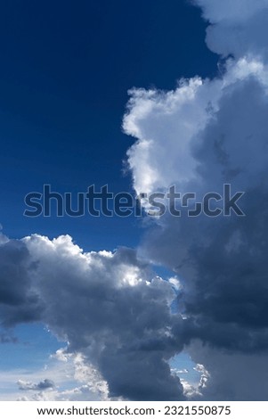 Emerging rain clouds (Nimbostratus), Bavaria, Germany