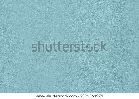 Pretty mint-colored cement wall texture Royalty-Free Stock Photo #2321563971