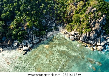 Tropical  beach and coconut tree  in thailand