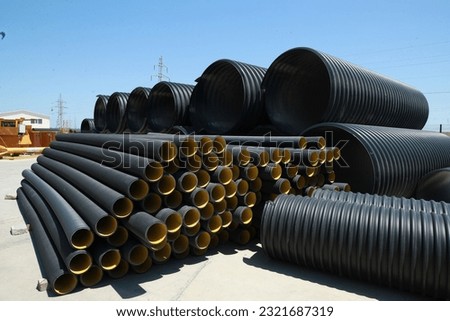 HDPE Double Wall Corrugated Pipe, 
HDPE Pipes Manufacturers, HDPE DWC Yellow pipes, Corrugated pipes with different sizes Royalty-Free Stock Photo #2321687319
