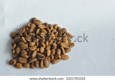 picture of arabica coffee beans on a white background