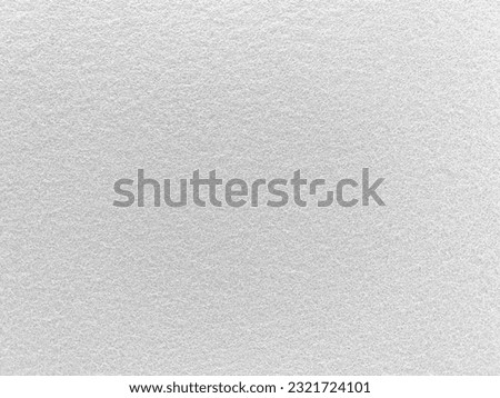 Felt white soft rough textile material background texture close up,poker table,tennis ball,table cloth. Empty white fabric background. velvet white luxury. Royalty-Free Stock Photo #2321724101