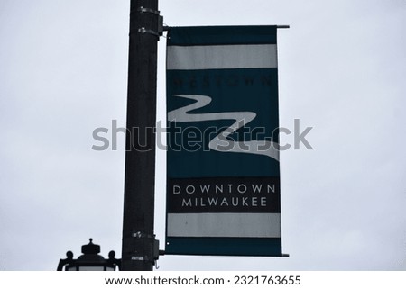 Downtown Milwaukee banner text sign on street