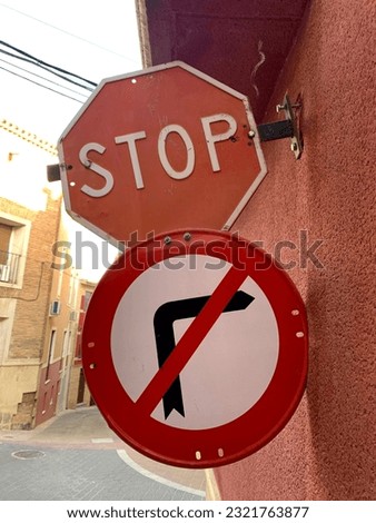 A vertical shot of the traffic signs