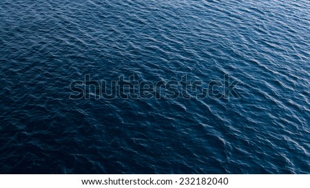 Blue sea water in calm Royalty-Free Stock Photo #232182040