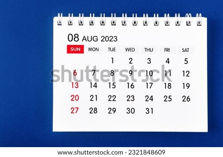 August 2023 Monthly desk calendar for 2023 year on dark blue background. Royalty-Free Stock Photo #2321848609