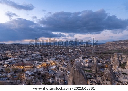 A picture of the town of Goreme, in Cappadocia, at sunset.
