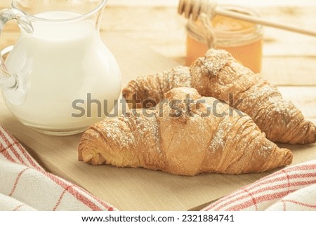 Croissants for breakfast. Delicious breakfast with fresh croissants. Copy space. Place for text