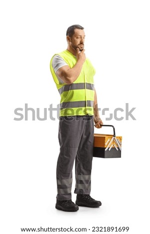 Road assistance mechanic holding a tool box and thinking isolated on white background