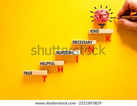 Think symbol. Concept words Think before you speak true helpful inspiring necessary kind on wooden block. Beautiful yellow background. Business Think true helpful inspiring necessary kind concept.