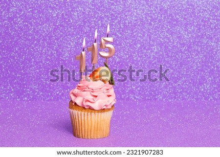 Cupcake With Number For Celebration Of Birthday Or Anniversary; Number 115