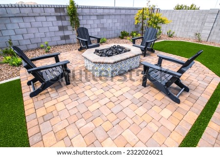 Back Yard Fire Pit With Four Wooden Arm Chairs