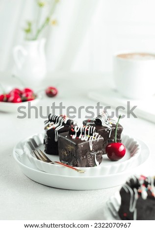 Mini Black Forest cake in white background.