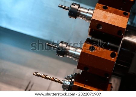 Capstan head with drill of lathe machine tool at factory