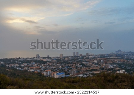 Pictures of the atmosphere of Pattaya city view in the morning Of Chonburi province in Thailand, there are both houses and condo buildings. There are white, blue, orange buildings, crowded together, p