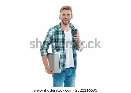 cheerful millennial man freelancer in studio. photo of millennial man freelancer with laptop.