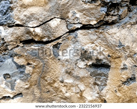 Grunge stone or rock wall textured background