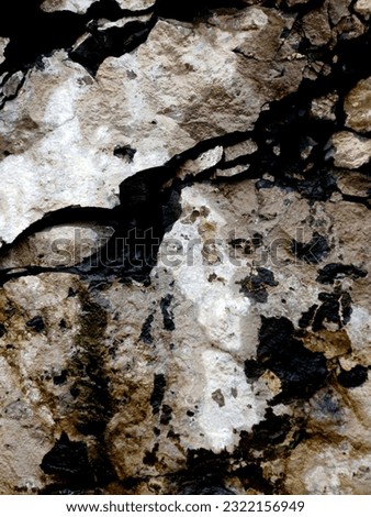 Grunge stone or rock wall textured background