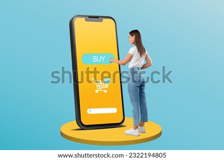 Young lady touching huge display panel and buying clothes online in store, standing on blue studio background, full length, creative collage