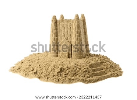 Pile of sand with beautiful castle isolated on white. Outdoor play