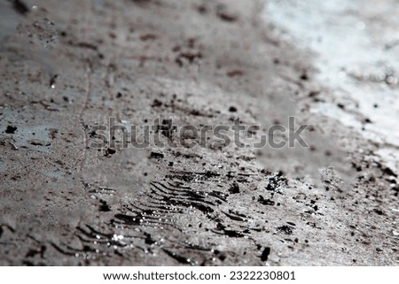 Wild Dirt and Mud Tire Tracks: Gritty Background for Off-Roading and Outdoor Adventure Designs
