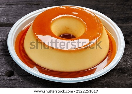 Condensed milk pudding with eggs Royalty-Free Stock Photo #2322251819