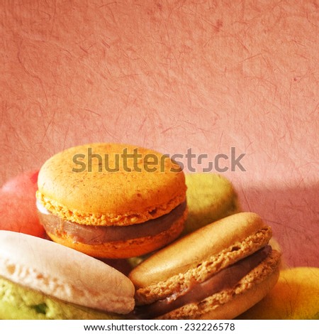 vivid color macarons on mulberry paper texture for background