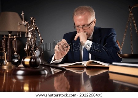 Lawyer signs the contract. Business law concept.