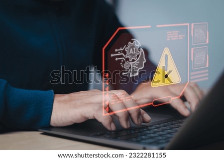 Users show alert about using smart technology(Ai) with a virtual screen on computer. Access to malicious software or online hacker threats. concept cyber security and Tech warning or scam. Royalty-Free Stock Photo #2322281155