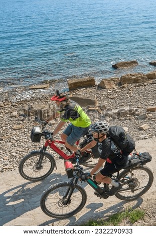 active senior couple on a mountain bike tour at Capodistria, Slovenian Mediterranen cost near Izola and Koper Royalty-Free Stock Photo #2322290933