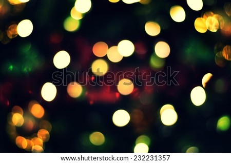 Christmas background. Festive abstract background with bokeh defocused vintage color