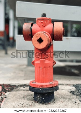 Typical red fire hydrant on street