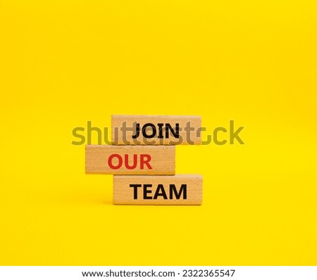 Join our team symbol. Wooden blocks with words Join our team. Beautiful yellow background. Business and Join our team concept. Copy space.