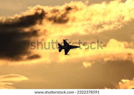 Leszno, Poland - 06 17 2023

Polish Air Force General Dynamics F-16C Fighting Falcon flying during sunset at Leszno Antidotum 2023 Royalty-Free Stock Photo #2322378591