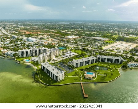 Waterfront condominium buildings in Jupiter FL USA shot with aerial drone