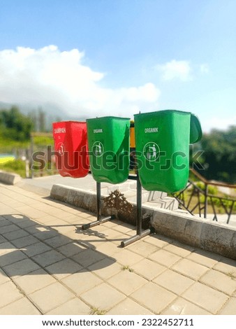 trash bins along with a description of the type of waste placed in the jumprit rest area tourist area to maintain the cleanliness of the tourist area